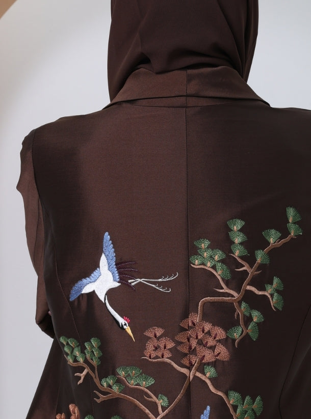 Embracing Earthly Elegance: Discover the Living Tapestry of Brown in Our Abaya Collection, Where Threads Weave Stories of Branches, Rustling Leaves, and Soaring Birds.