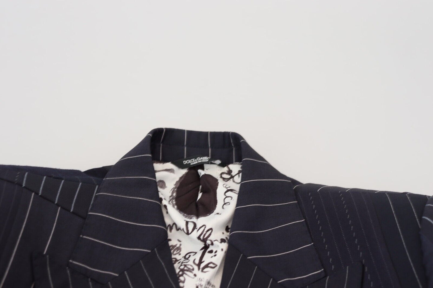 دولتشي آند غابانا سترة زرقاء داكنة مزدوجة الصدر بقصة ضيقة