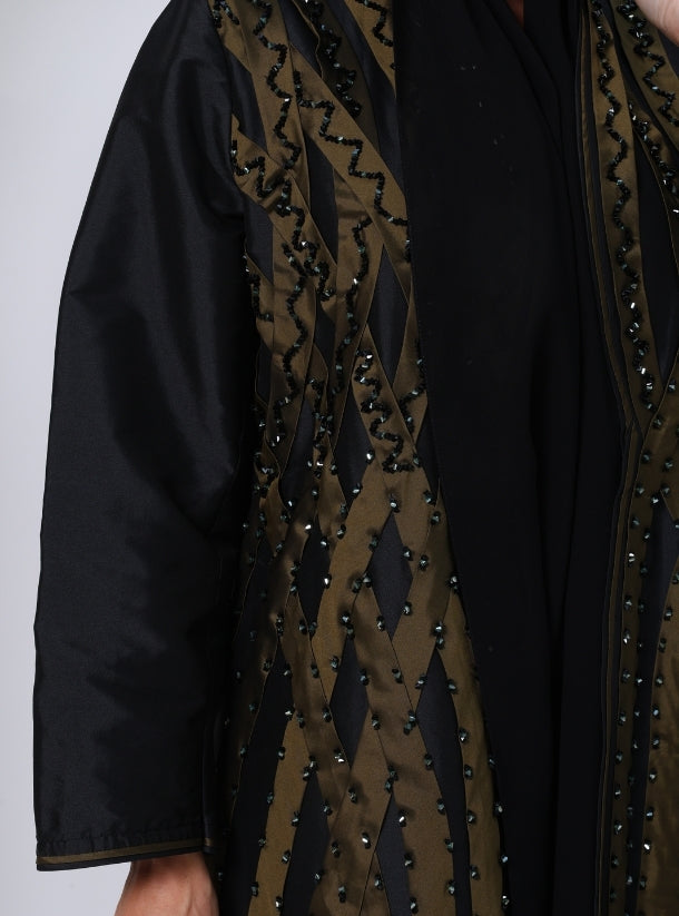 Golden Sands: Modern Style, Golden Ribbon Style Designs Adorned with Fine Black Crystals.