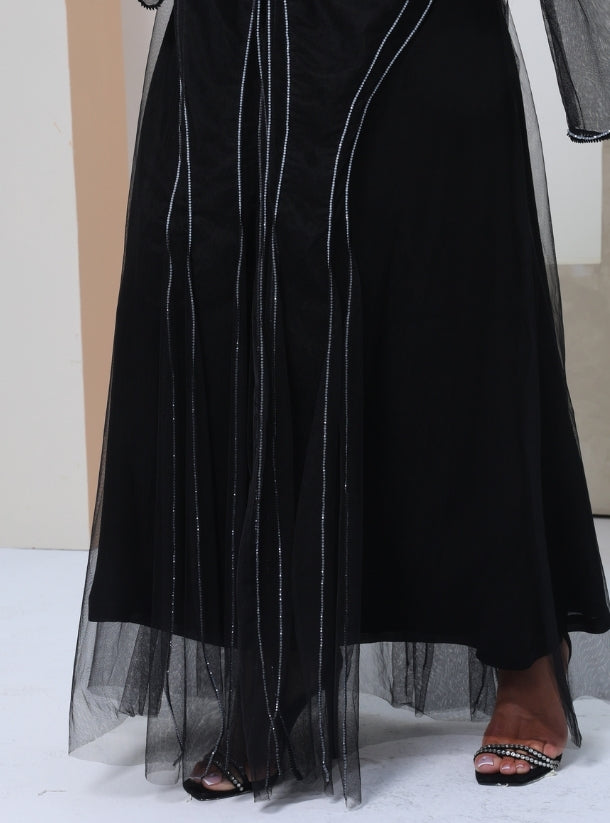 Stardust Elegance: A Luxurious Black Tulle Abaya Adorned with Exquisite Crystalline Wave Patterns.
