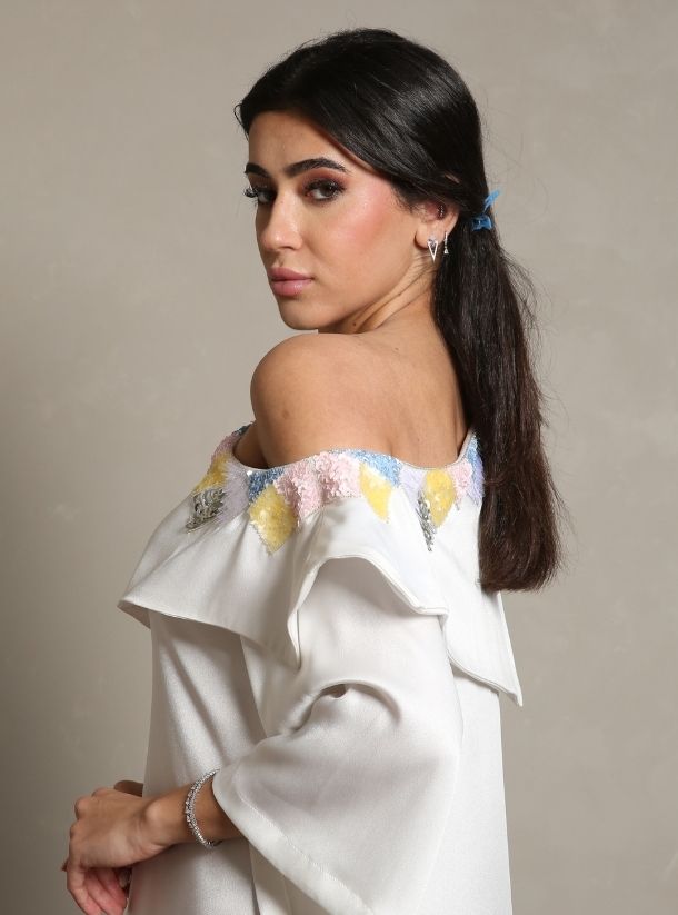 Effortless Glamour, Off-Shoulder Jalabiya Sparkles with Pastel Sequins.