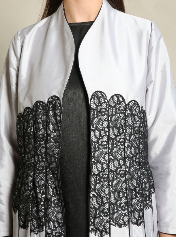 Graceful Simplicity, The Chic Elegance of Grey Open Abaya with Pleats and Frontal Black Embroidery.