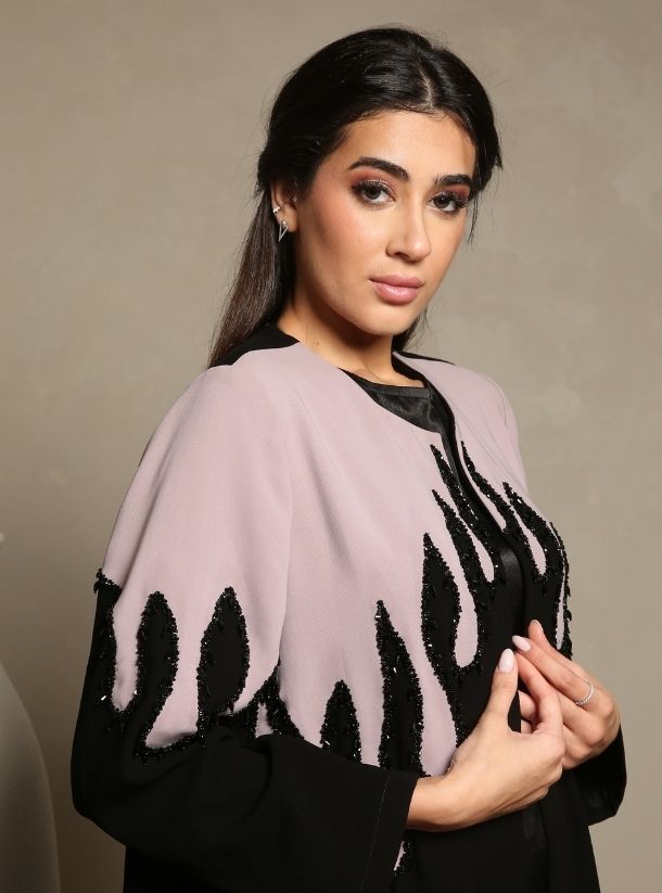 Bold and Beautiful, Faded Pink and Black Fire Beads Abaya Exudes Confidence.