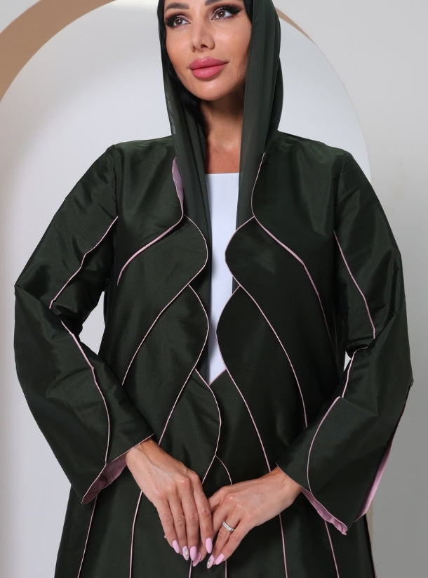 Enchanting Harmony: Where Lotus Pink Petals Meet Deep Green Folds in a Couture Symphony of Nature and Culture.