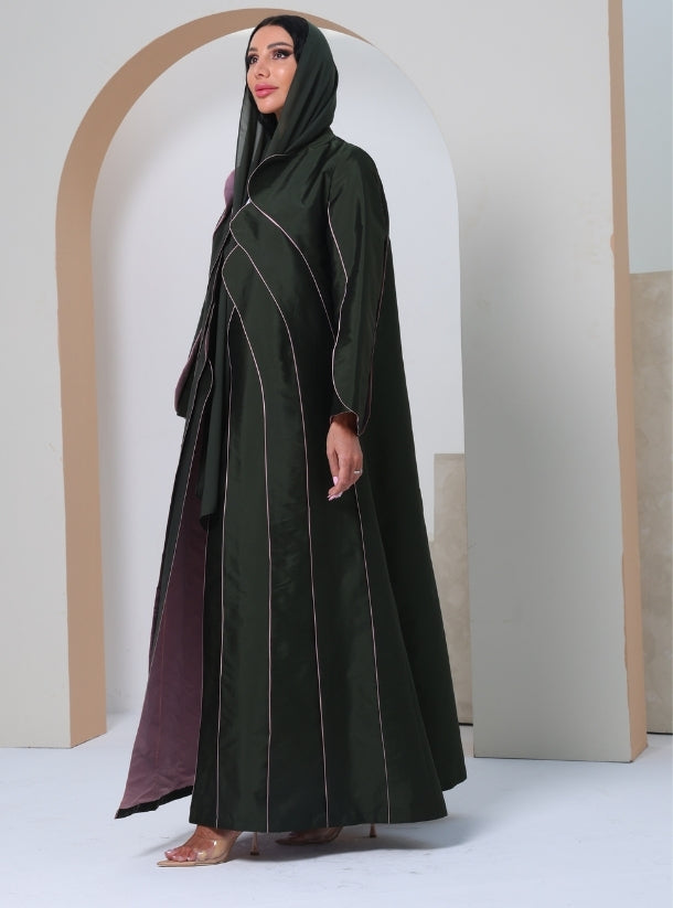 Enchanting Harmony: Where Lotus Pink Petals Meet Deep Green Folds in a Couture Symphony of Nature and Culture.