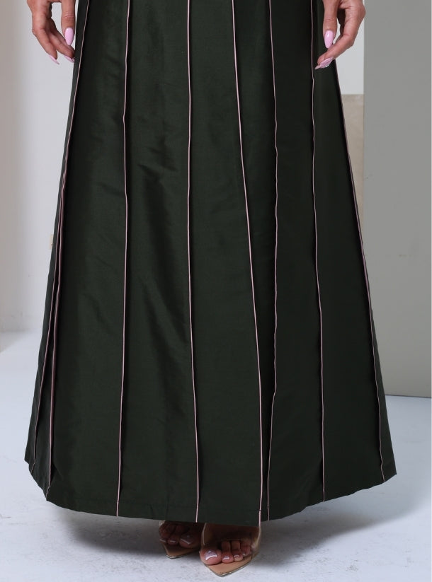 Enchanting Harmony: Where Lotus Pink Petals Meet Deep Green Folds in a Couture Symphony of Nature and Culture.