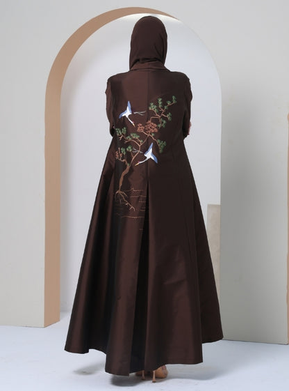 Embracing Earthly Elegance: Discover the Living Tapestry of Brown in Our Abaya Collection, Where Threads Weave Stories of Branches, Rustling Leaves, and Soaring Birds.