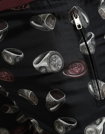 بنطال الركض الحريري الأنيق من دولتشي آند غابانا بطبعة الخاتم