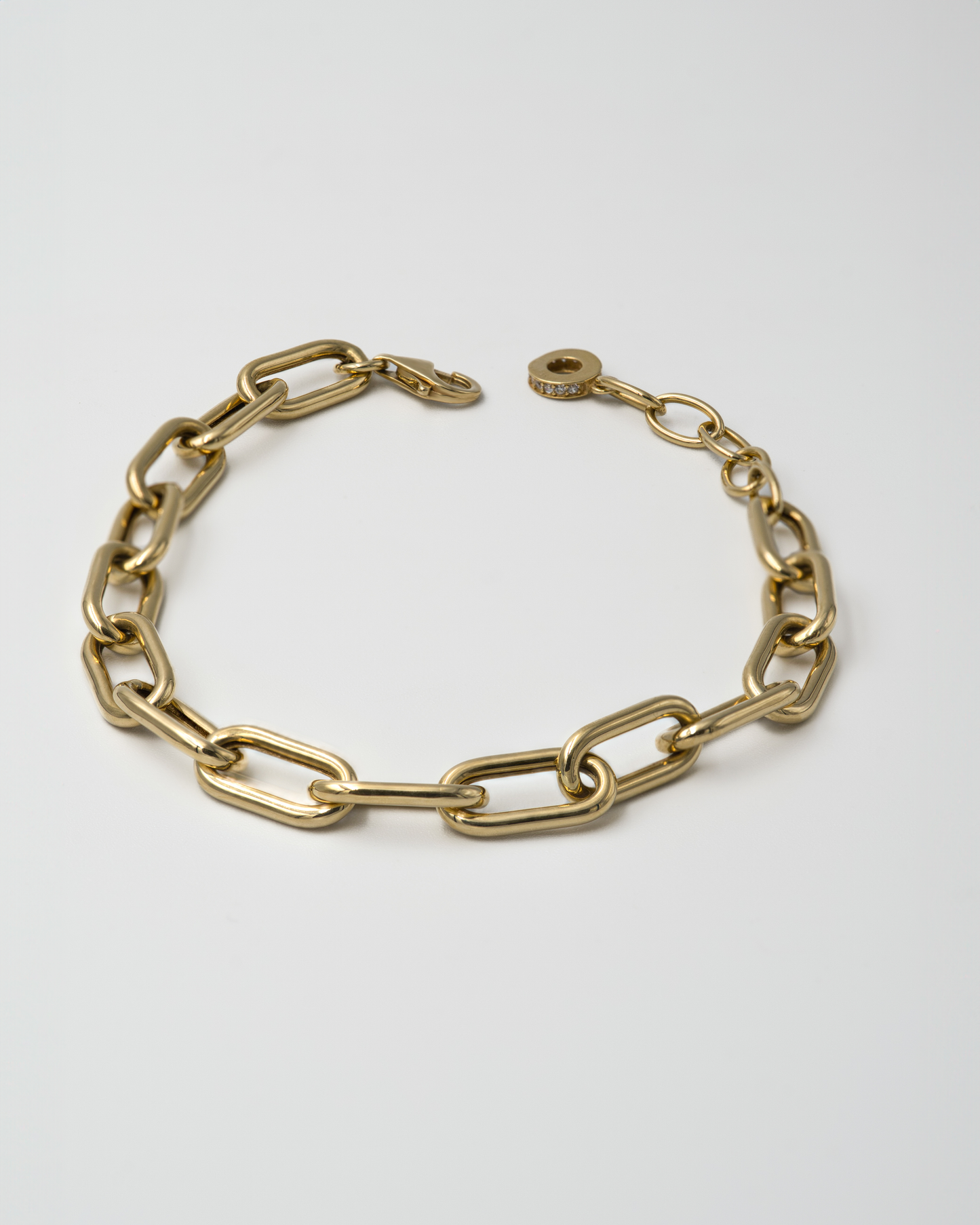 18K GOLD INTERLOCKING BRACELET