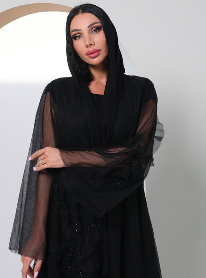 Midnight Glamour: A Luxurious Black Tulle Abaya Embellished with Intricate Interwoven Patterns and Subtle Crystalline Accents.