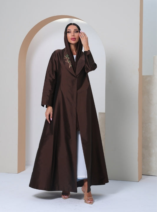 Embracing Earthly Elegance: Discover the Living Tapestry of Brown in Our Abaya Collection, Where Threads Weave Stories of Branches, Rustling Leaves, and Soaring Birds.