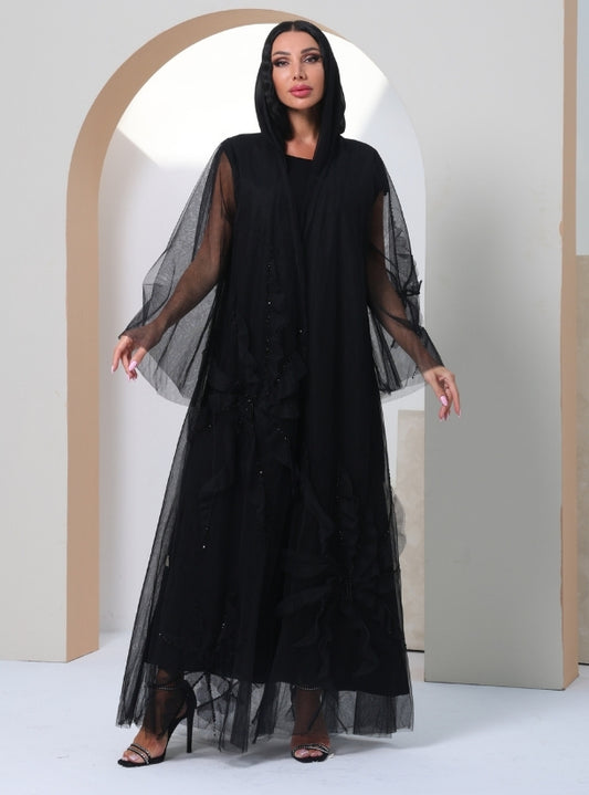 Midnight Glamour: A Luxurious Black Tulle Abaya Embellished with Intricate Interwoven Patterns and Subtle Crystalline Accents.