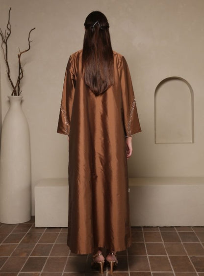 A Symphony of Style, Brown Raindrop Abaya Sleeves Craftsmanship.