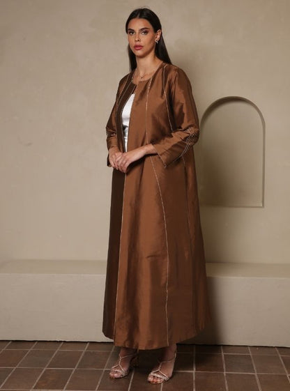 A Symphony of Style, Brown Raindrop Abaya Sleeves Craftsmanship.