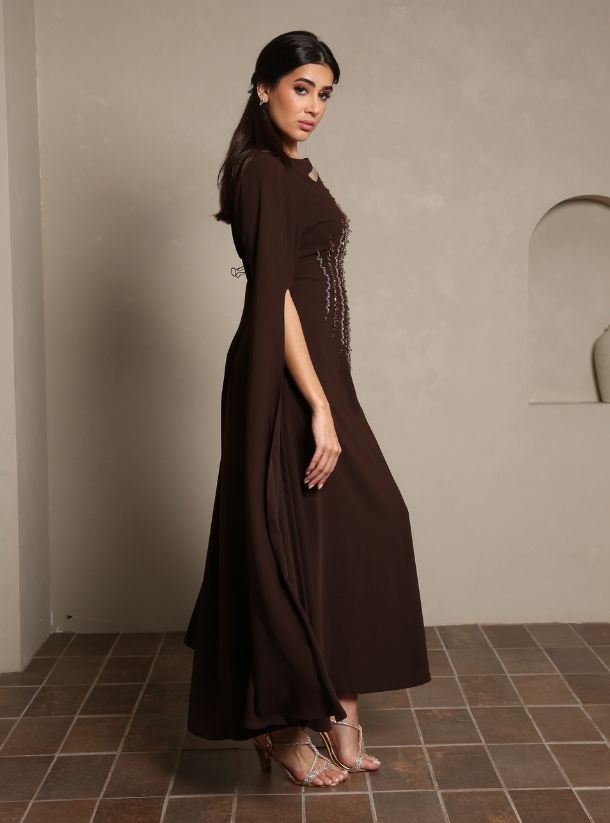 Luxurious Detailing: Corset Line Beads Work Adds Opulence to Jalabiya.